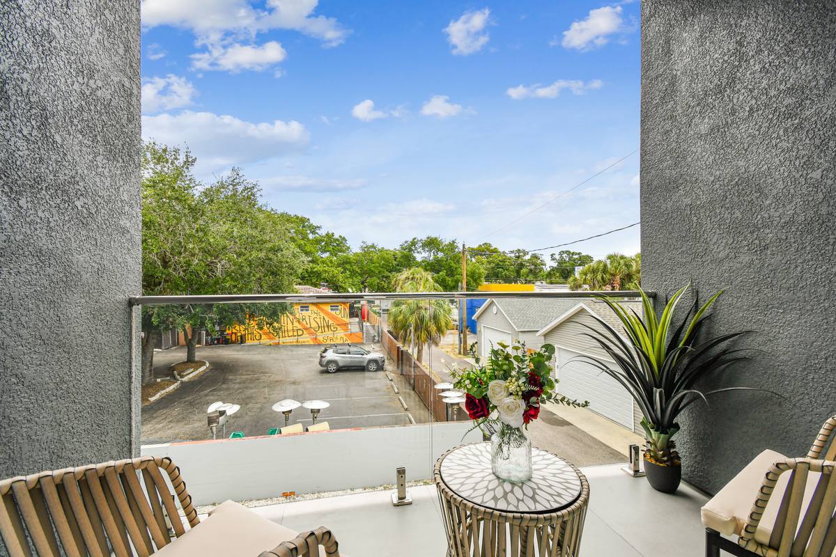 Balcony with seating and downtown views at St. Pete sun-soaked rental