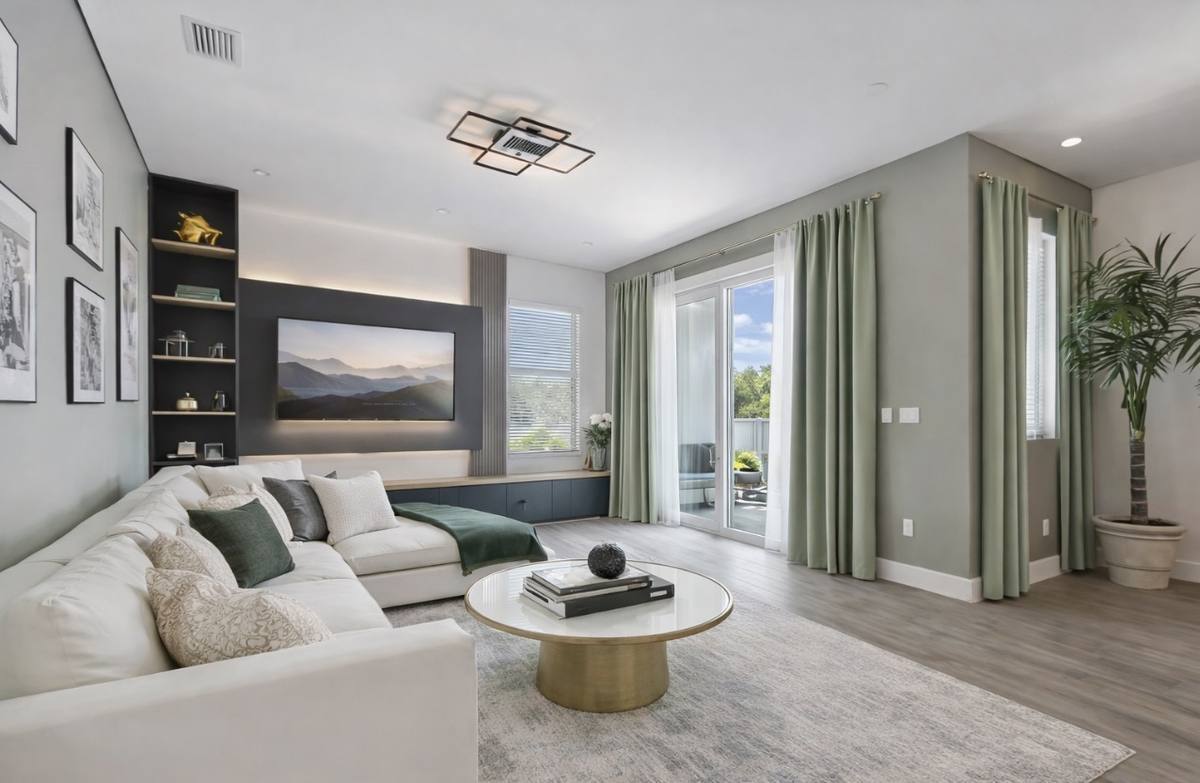 King bedroom with sage walls and curated art at St. Pete modern retreat