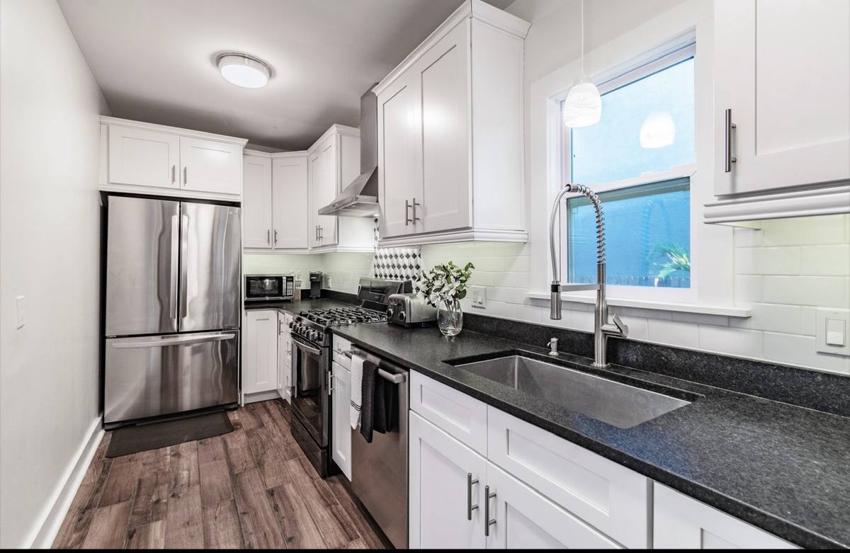 Updated kitchen with stainless appliances at St. Pete vacation rental